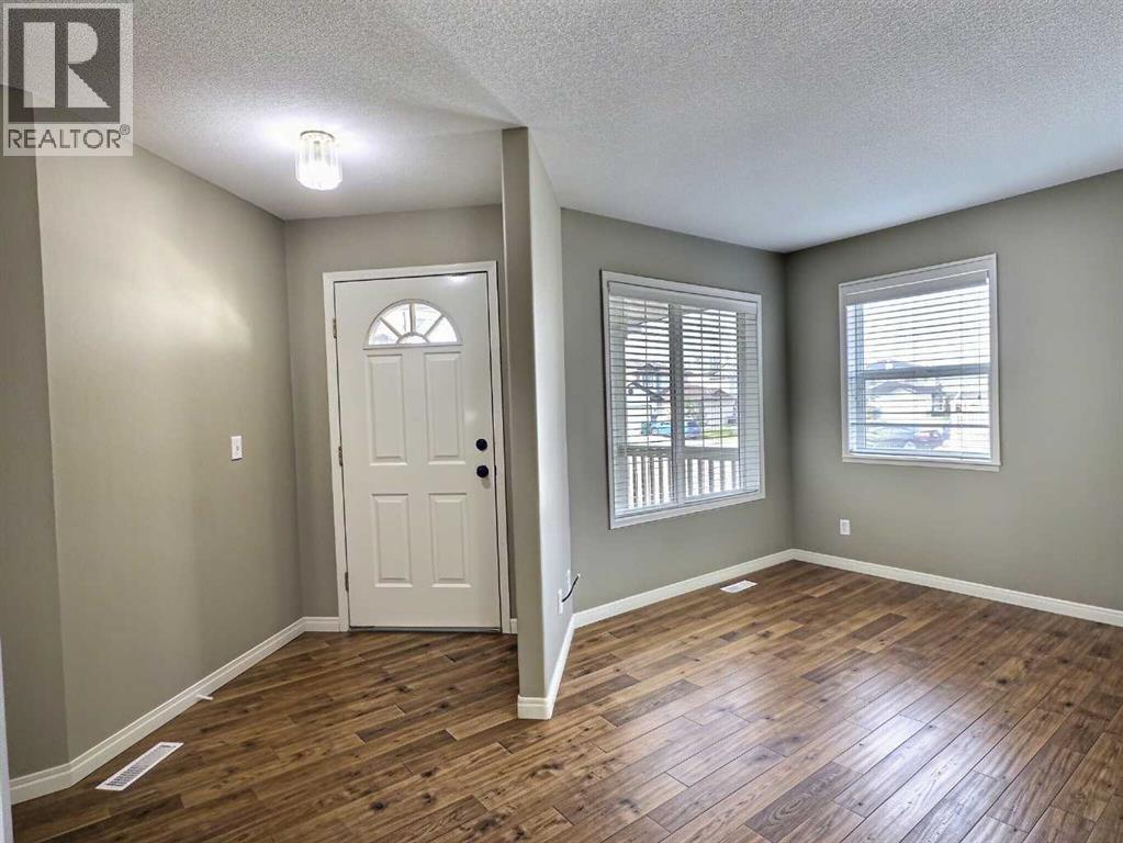 185 Tuscarora Close Nw, Calgary, Alberta  T3L 2E3 - Photo 6 - A2330549