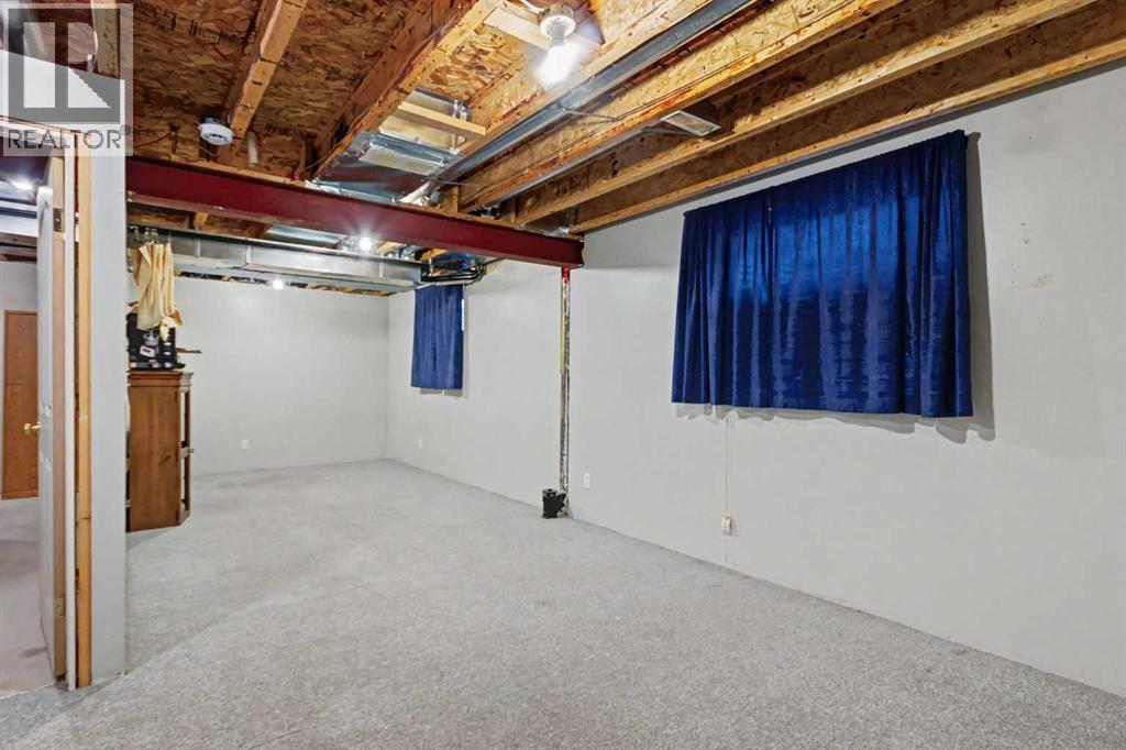 311 Erin Circle SE, Calgary, Alberta  T2B 3J1 - Photo 20 - A2334235