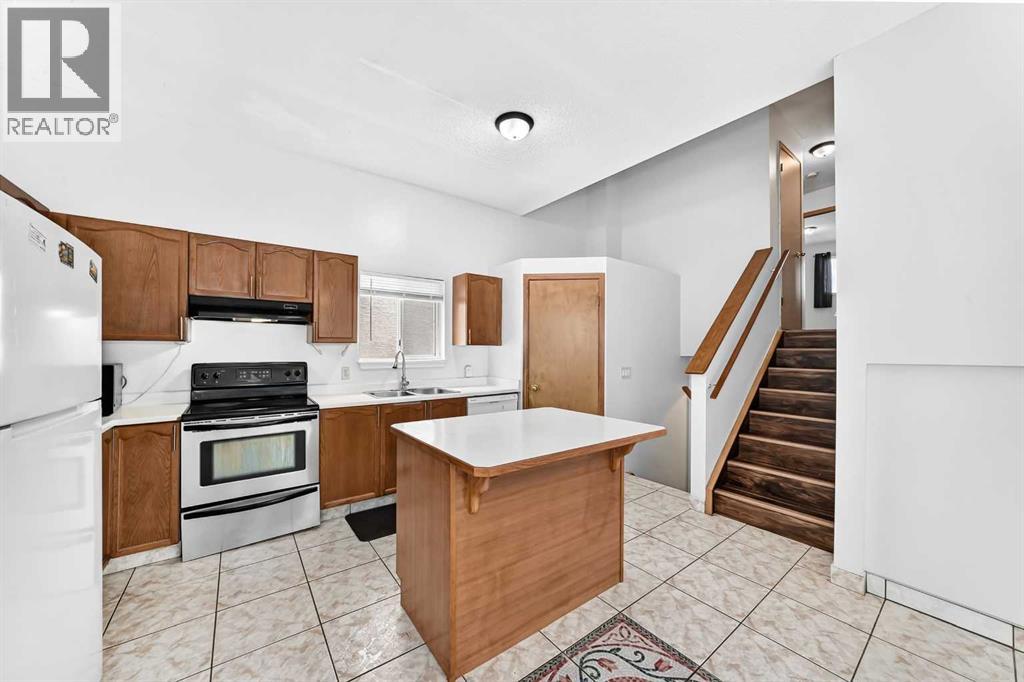 6934 Laguna Way NE, Calgary, Alberta  T1Y 6W2 - Photo 7 - A2330918