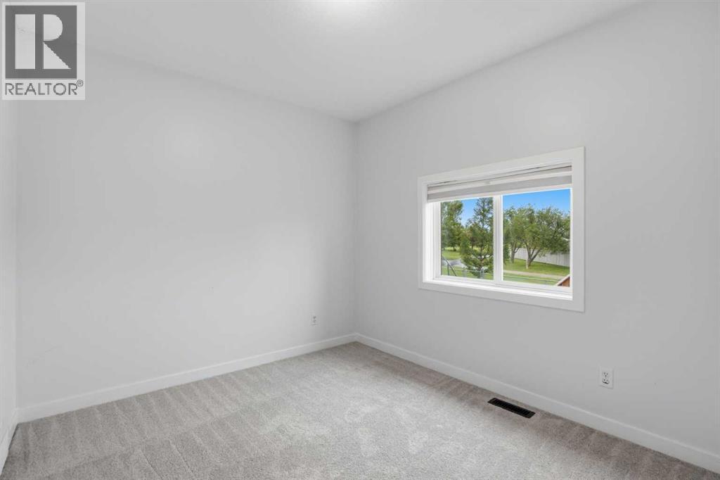 319 Coventry Road NE, Calgary, Alberta  T3K 5K5 - Photo 18 - A2322322