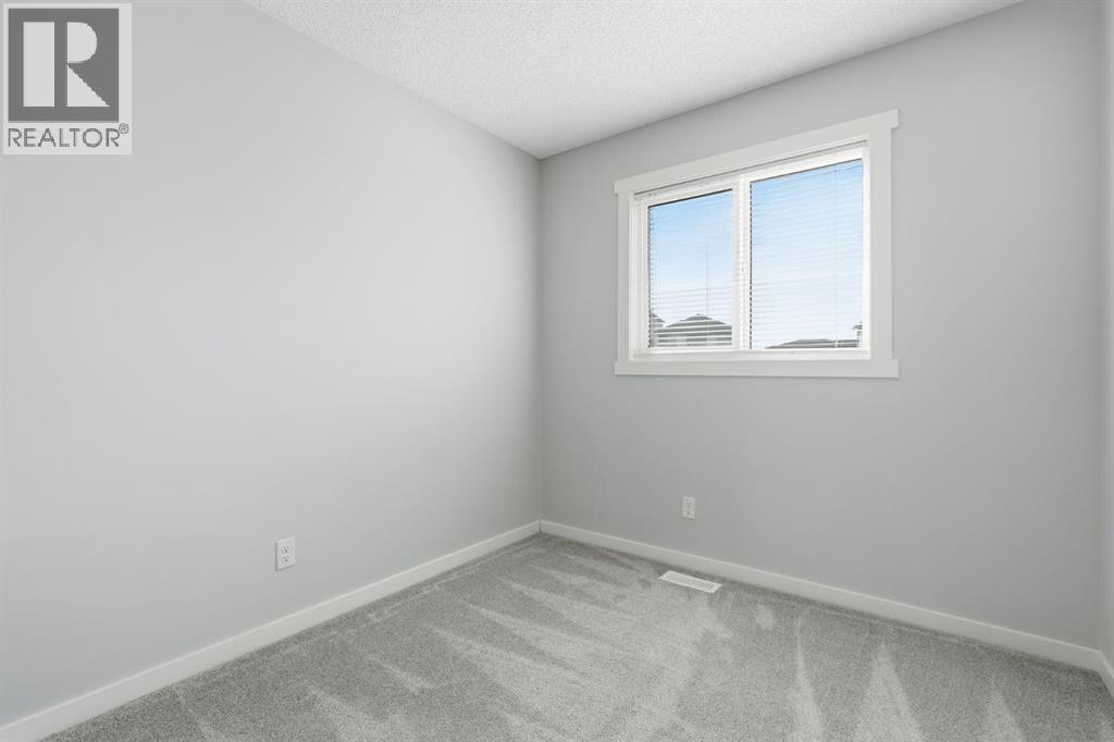 141 Belmont Drive SW, Calgary, Alberta  T2X 4Z7 - Photo 21 - A2330413