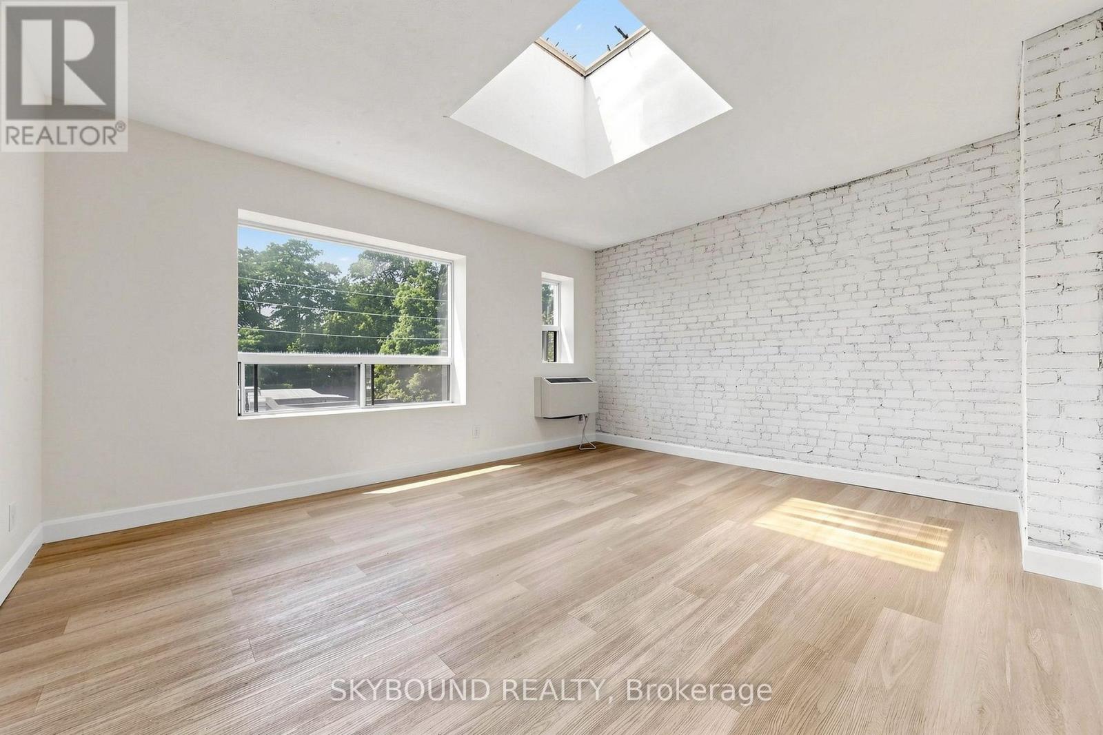 G - 131 Wineva Avenue, Toronto, Ontario  M4E 2T3 - Photo 2 - E13475112