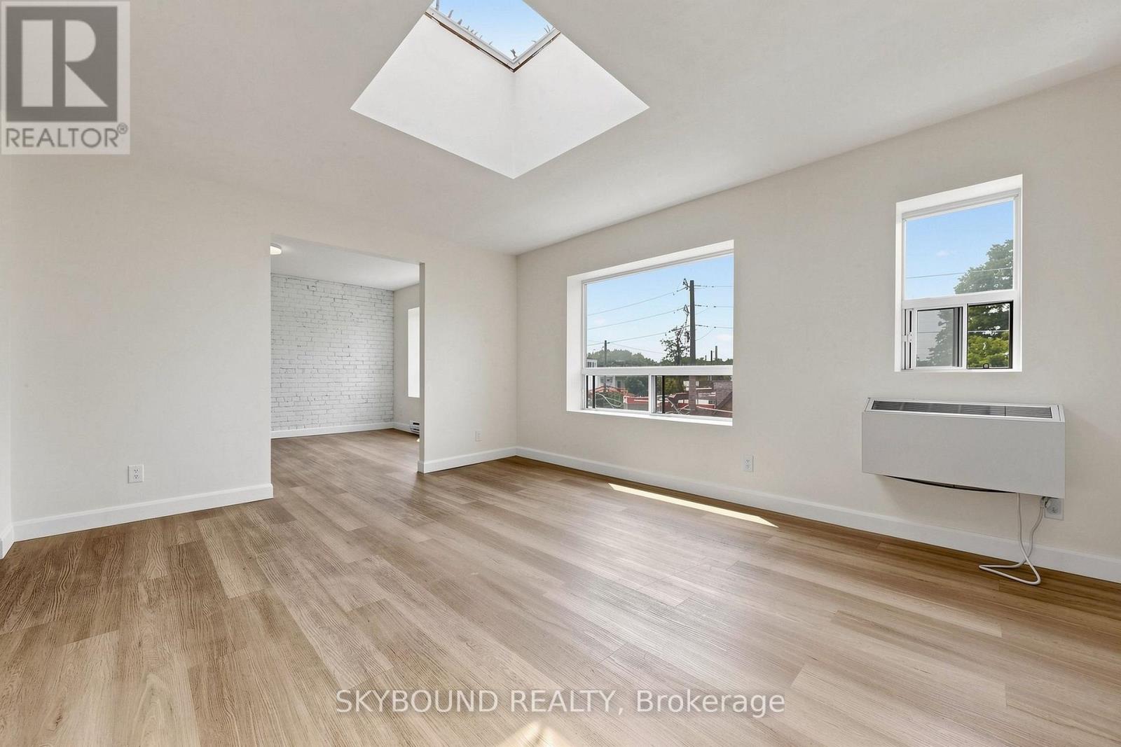 G - 131 Wineva Avenue, Toronto, Ontario  M4E 2T3 - Photo 3 - E13475112