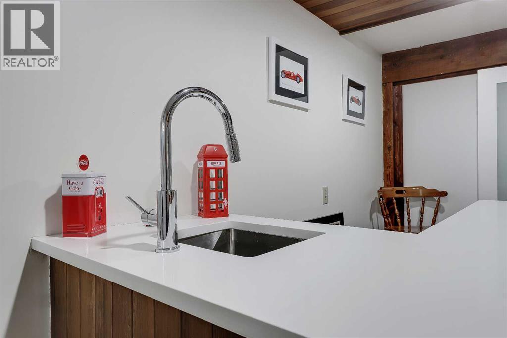 185 Springwood Drive SW, Calgary, Alberta  T2W 0L2 - Photo 18 - A2318547