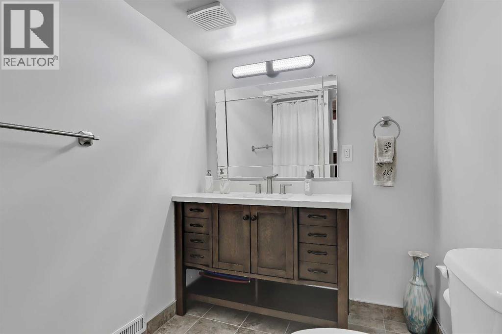 185 Springwood Drive SW, Calgary, Alberta  T2W 0L2 - Photo 20 - A2318547