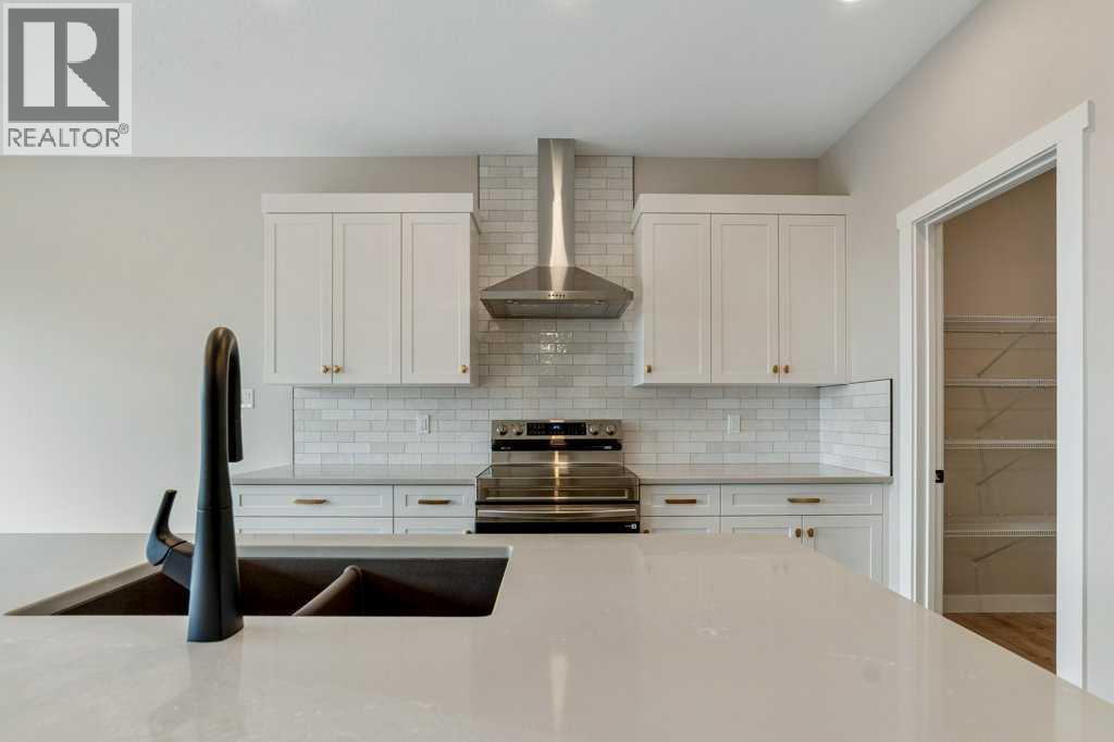 103 Riverford Close W, Lethbridge, Alberta  T1K 8E6 - Photo 4 - A2330240