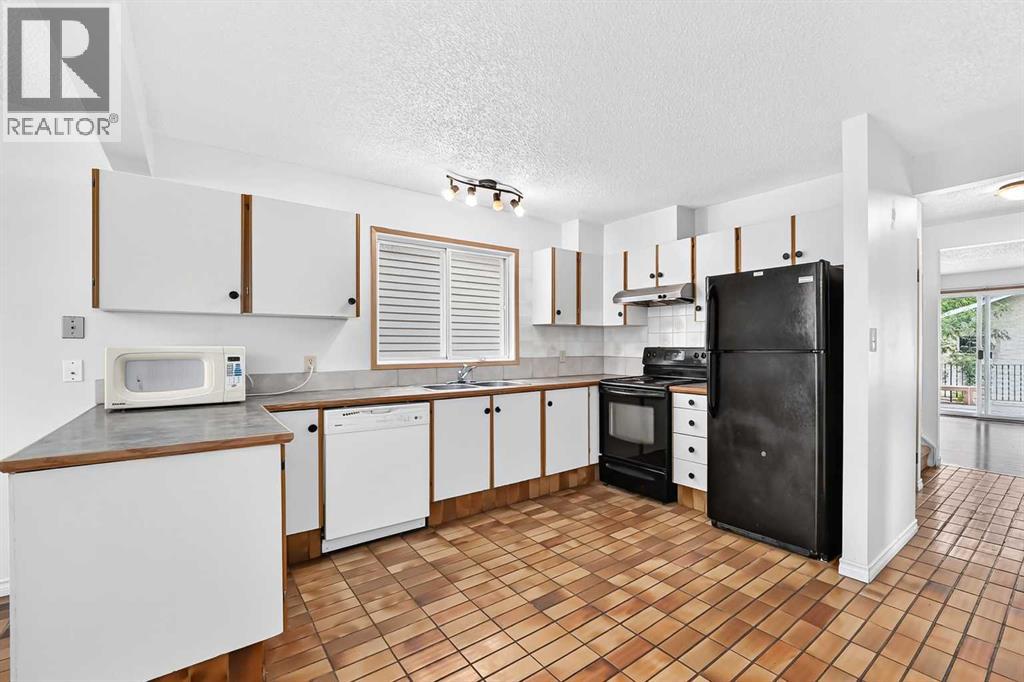 454 20 Avenue NW, Calgary, Alberta  T2M 1C4 - Photo 4 - A2322620