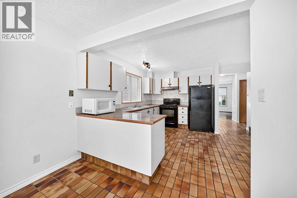 454 20 Avenue NW, Calgary, Alberta  T2M 1C4 - Photo 9 - A2322620