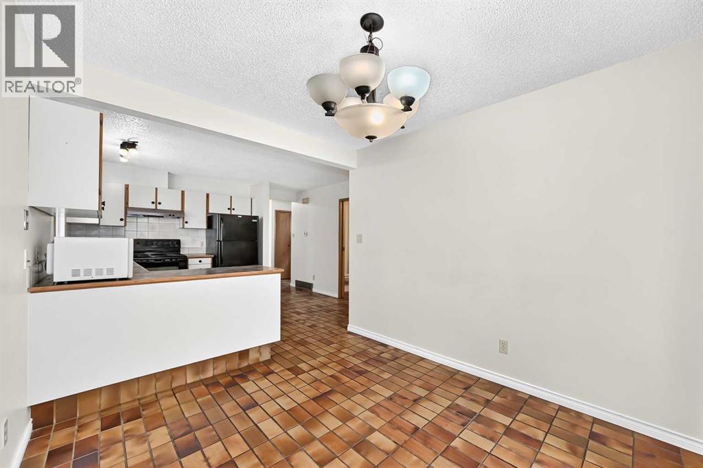 454 20 Avenue NW, Calgary, Alberta  T2M 1C4 - Photo 8 - A2322620