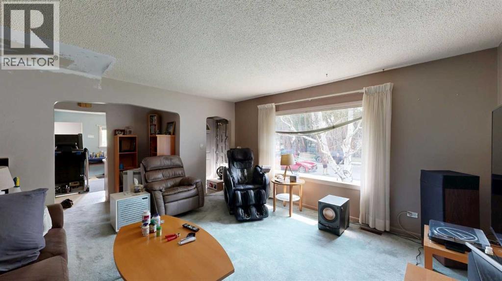 708 55 Avenue SW, Calgary, Alberta  T2V 0G3 - Photo 10 - A2335557