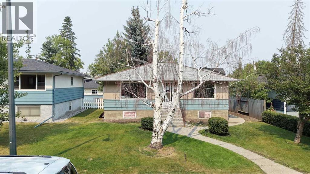708 55 Avenue SW, Calgary, Alberta  T2V 0G3 - Photo 4 - A2335557