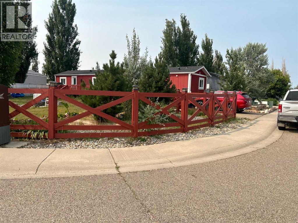 116 Meadow Lake  E, Brooks, Alberta  T1R 1G1 - Photo 1 - A2336057