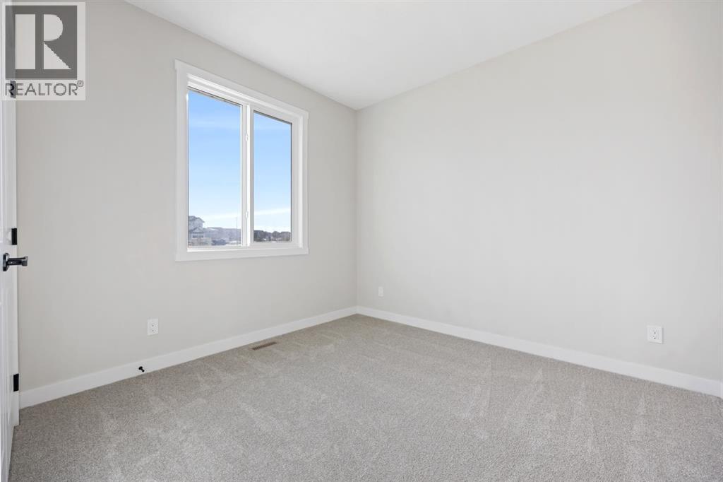 26 Baywater Rise SW, Airdrie, Alberta  T4B 3V3 - Photo 25 - A2335303