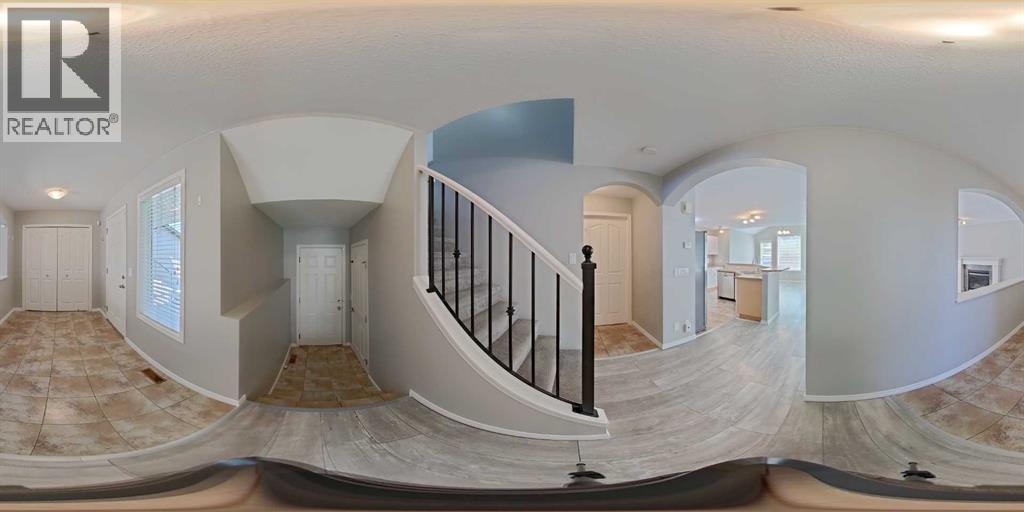27 Bridlerange Circle SW, Calgary, Alberta  T2Y 5H4 - Photo 3 - A2327686
