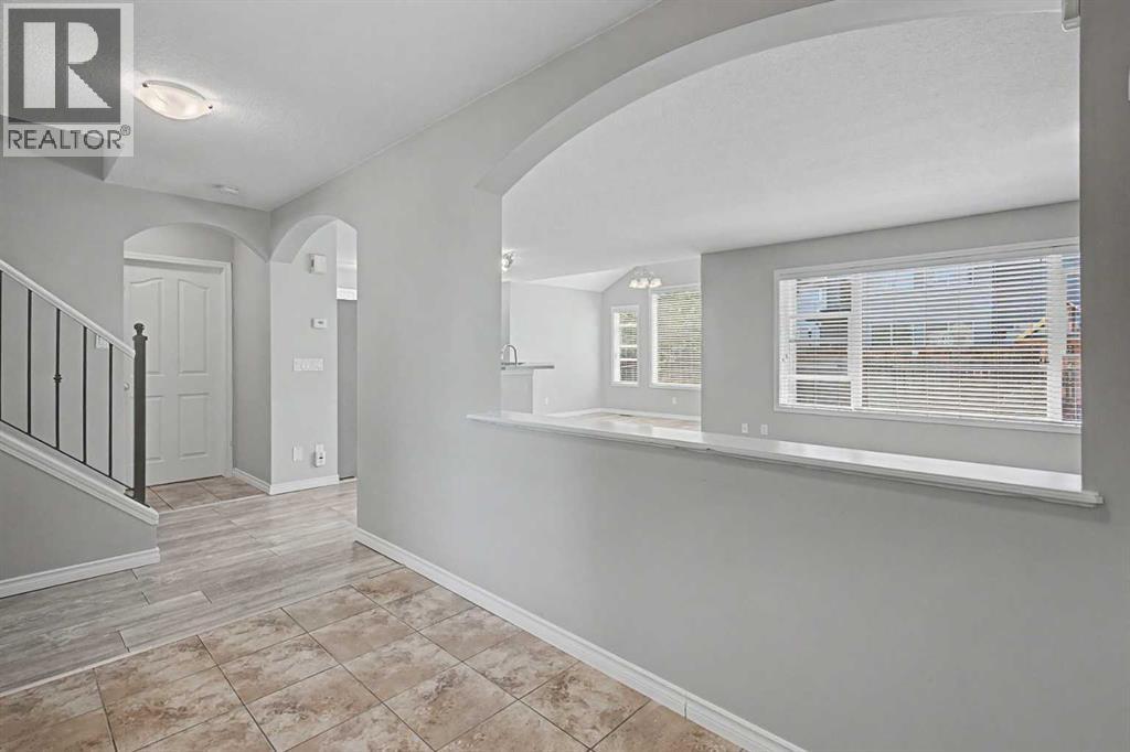 27 Bridlerange Circle SW, Calgary, Alberta  T2Y 5H4 - Photo 2 - A2327686
