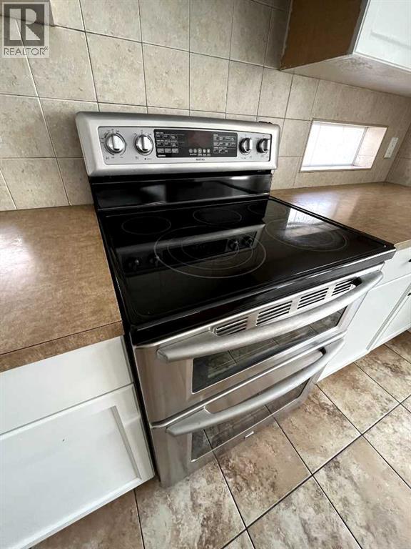 27 Bridlerange Circle SW, Calgary, Alberta  T2Y 5H4 - Photo 37 - A2327686