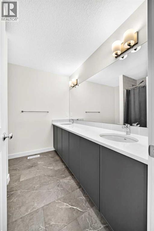 27 Belvedere Point Se, Calgary, Alberta  T2A 7Y9 - Photo 36 - A2324593