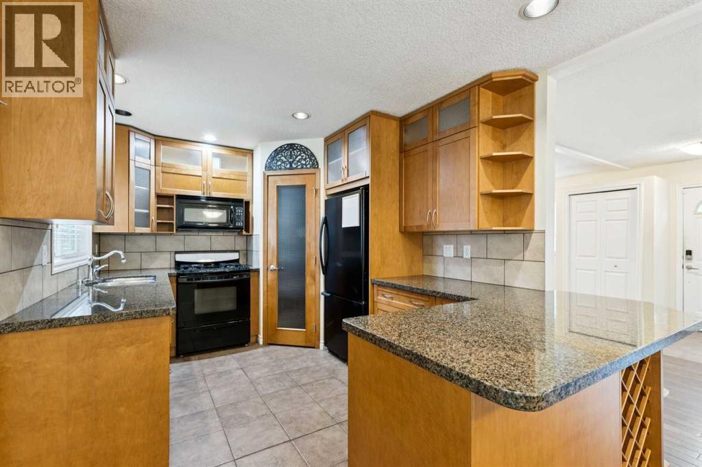 7615 36 Avenue Nw, Calgary, Alberta  T3B 1V2 - Photo 3 - A2308209