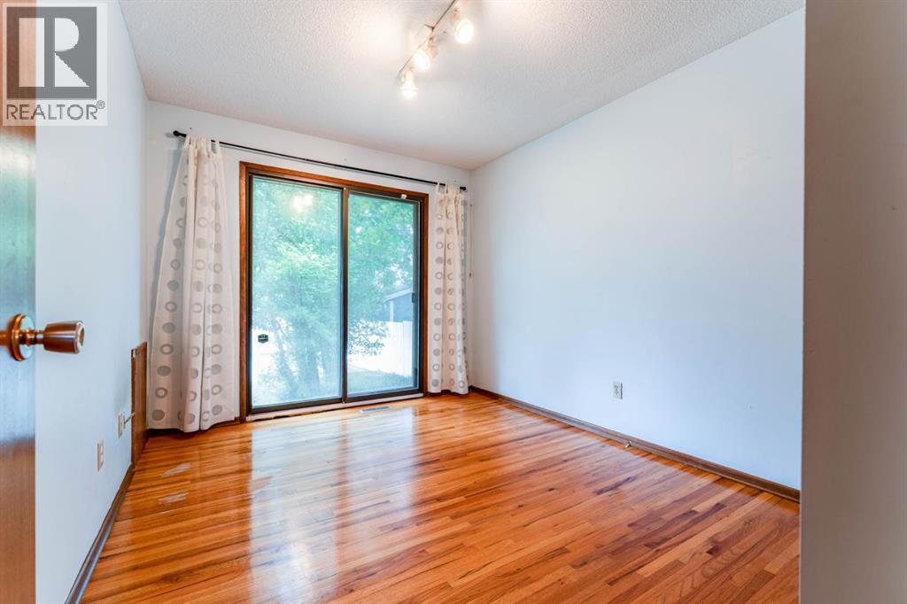 7511 Huntridge Crescent Ne, Calgary, Alberta  T2K 4C8 - Photo 14 - A2323516