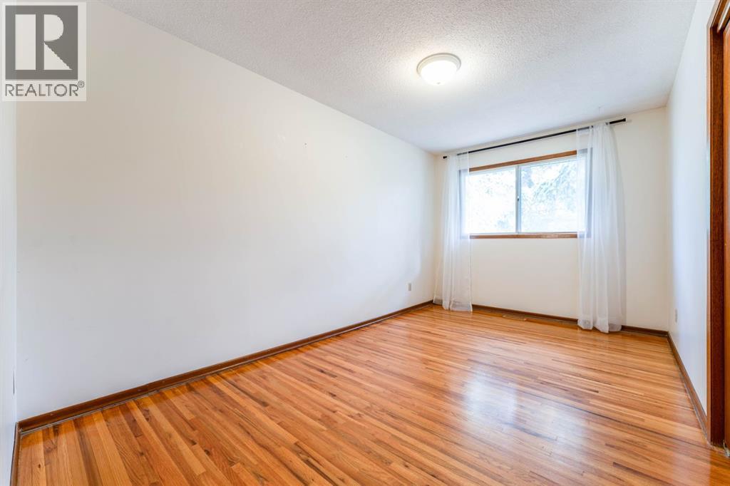 7511 Huntridge Crescent Ne, Calgary, Alberta  T2K 4C8 - Photo 20 - A2323516
