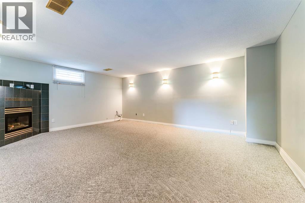 7511 Huntridge Crescent Ne, Calgary, Alberta  T2K 4C8 - Photo 24 - A2323516