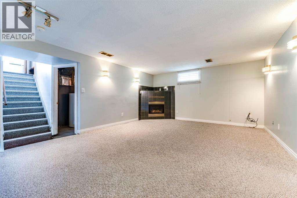7511 Huntridge Crescent Ne, Calgary, Alberta  T2K 4C8 - Photo 25 - A2323516