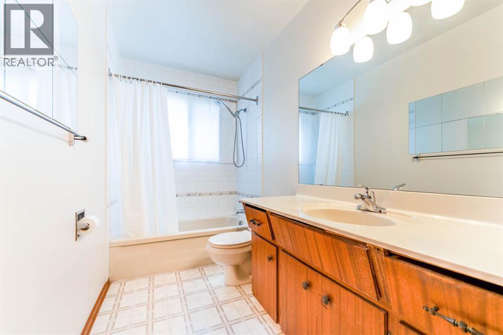 7511 Huntridge Crescent Ne, Calgary, Alberta  T2K 4C8 - Photo 22 - A2323516