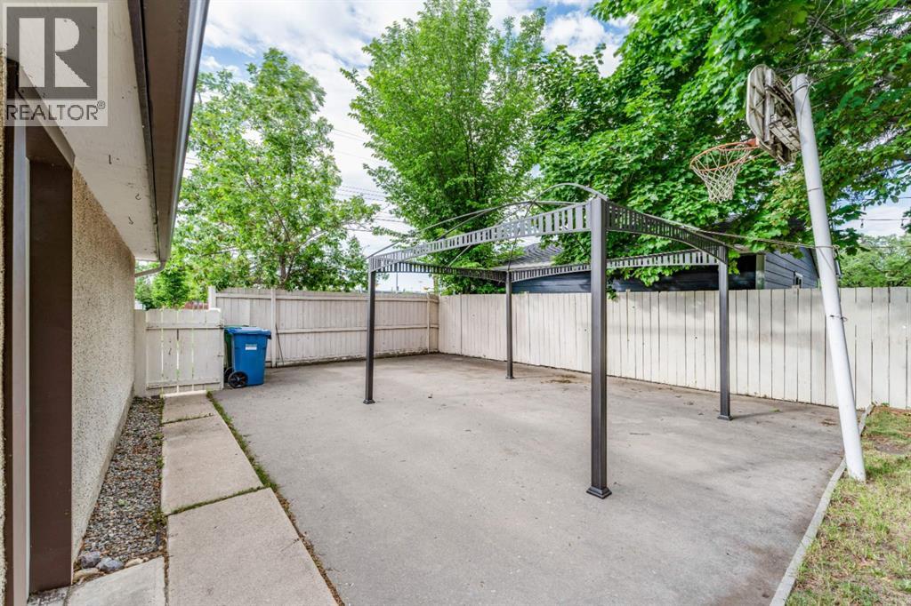 7511 Huntridge Crescent Ne, Calgary, Alberta  T2K 4C8 - Photo 38 - A2323516