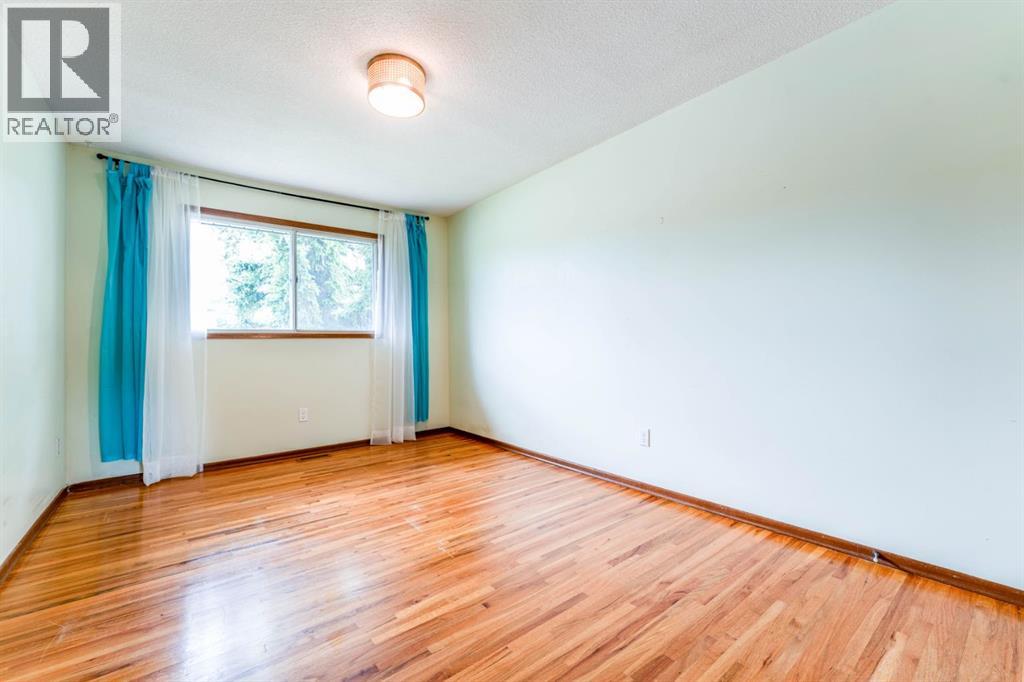 7511 Huntridge Crescent Ne, Calgary, Alberta  T2K 4C8 - Photo 17 - A2323516