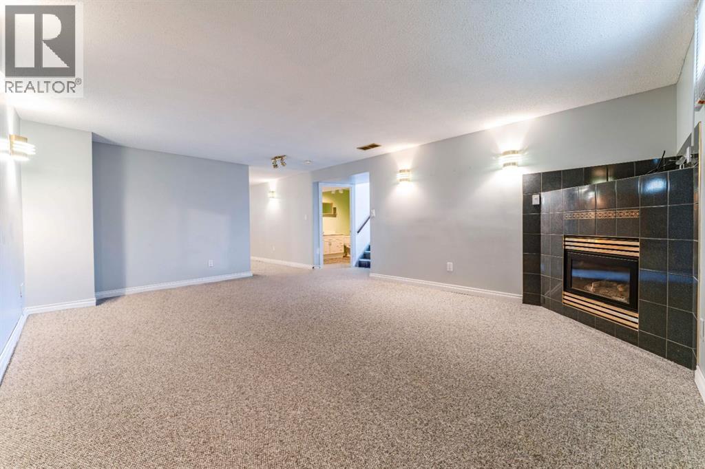 7511 Huntridge Crescent Ne, Calgary, Alberta  T2K 4C8 - Photo 26 - A2323516