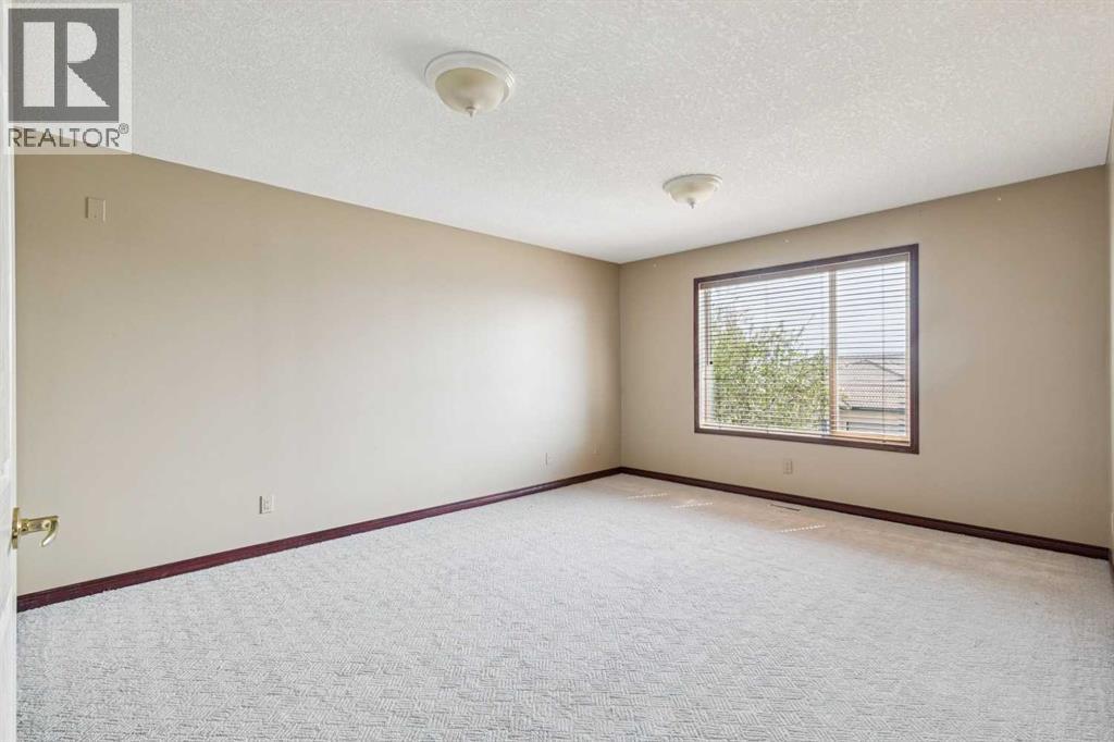 14 Strathearn Gardens Sw, Calgary, Alberta  T3H 2R1 - Photo 11 - A2314507