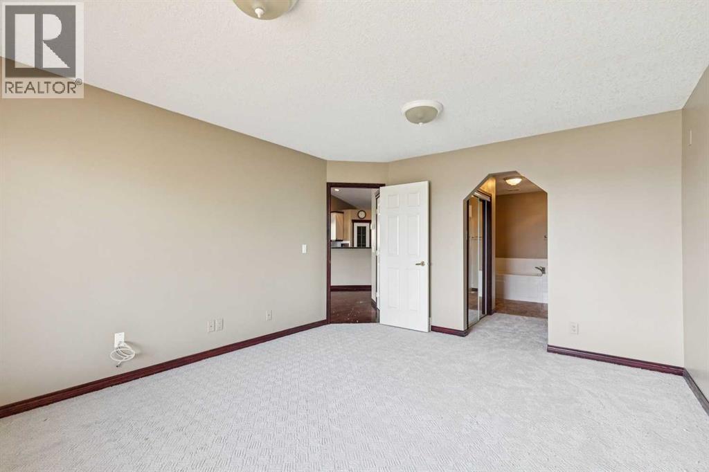 14 Strathearn Gardens Sw, Calgary, Alberta  T3H 2R1 - Photo 12 - A2314507