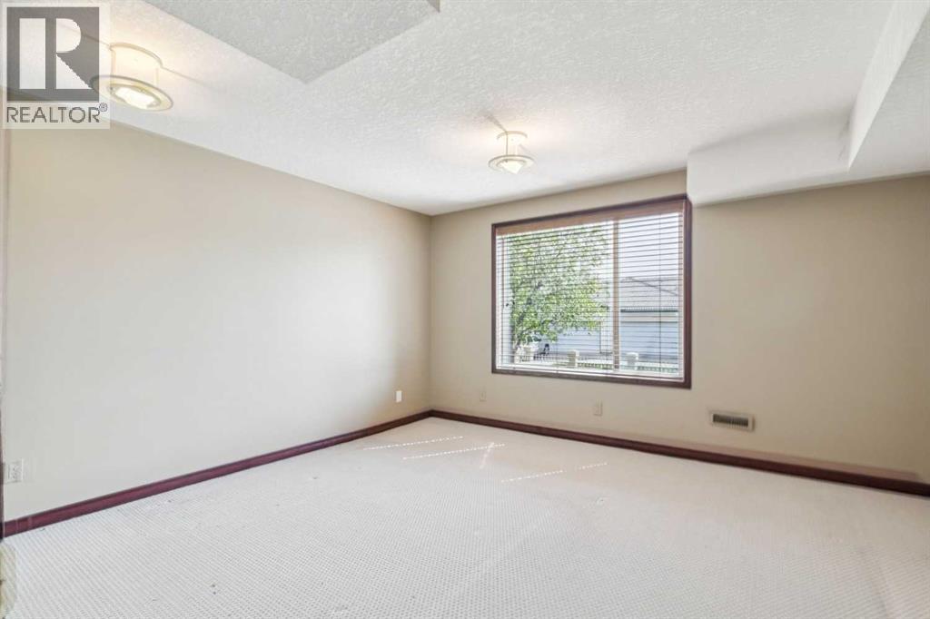 14 Strathearn Gardens Sw, Calgary, Alberta  T3H 2R1 - Photo 20 - A2314507