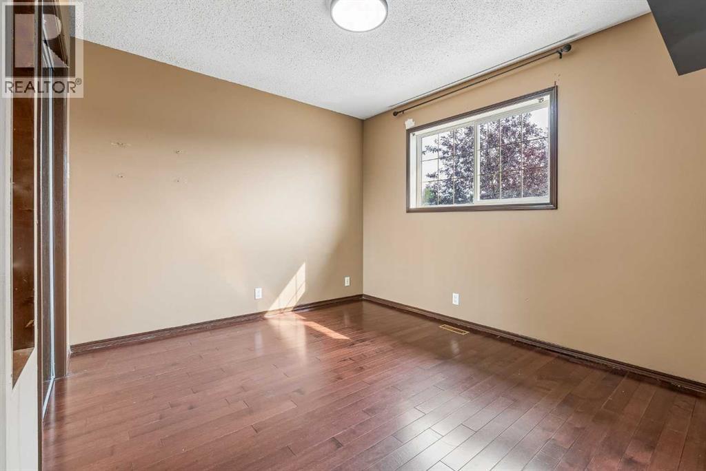 1116 Woodside Way Nw, Airdrie, Alberta  T4B 2S3 - Photo 24 - A2321546