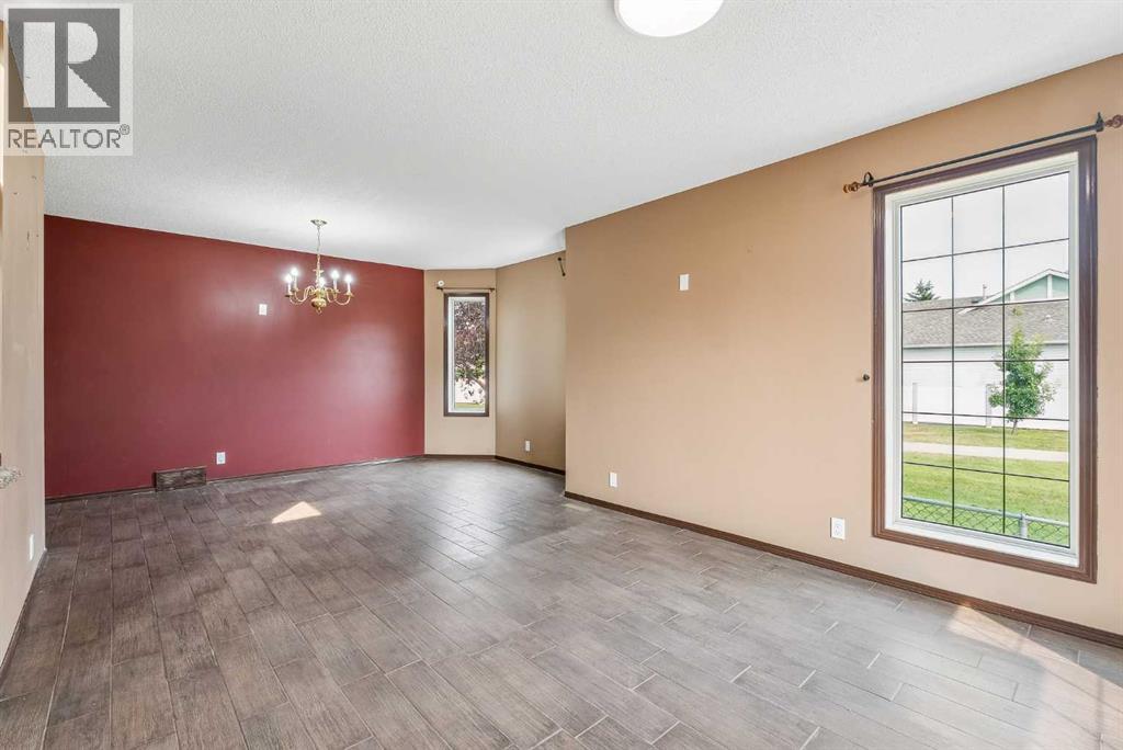 1116 Woodside Way Nw, Airdrie, Alberta  T4B 2S3 - Photo 8 - A2321546