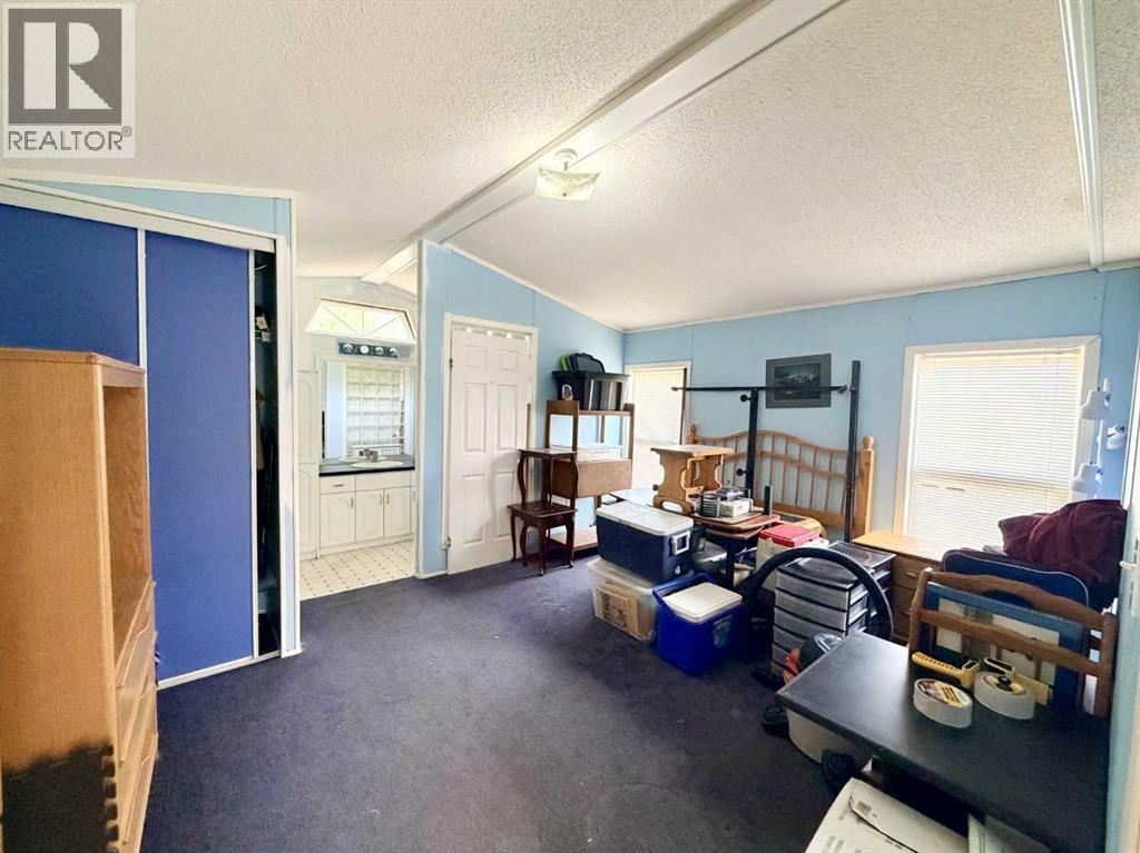 406 Picci Court, Linden, Alberta  T0M 1J0 - Photo 11 - A2336284