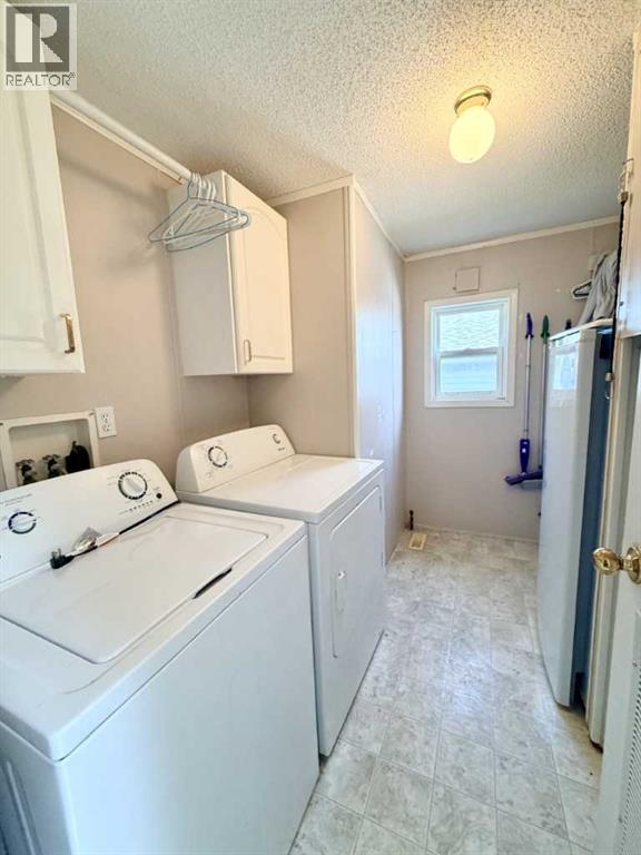 406 Picci Court, Linden, Alberta  T0M 1J0 - Photo 13 - A2336284