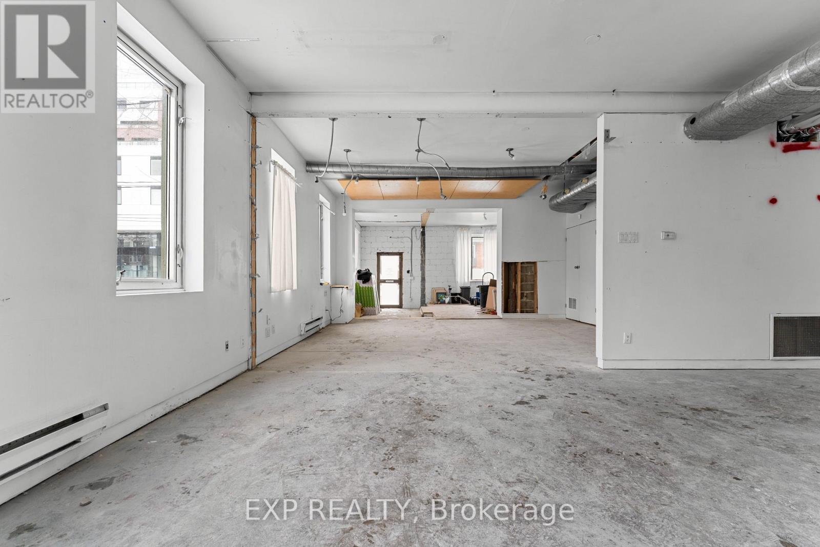 1558 Queen Street E, Toronto, Ontario M4L 1E8 - Photo 1 - E13664406