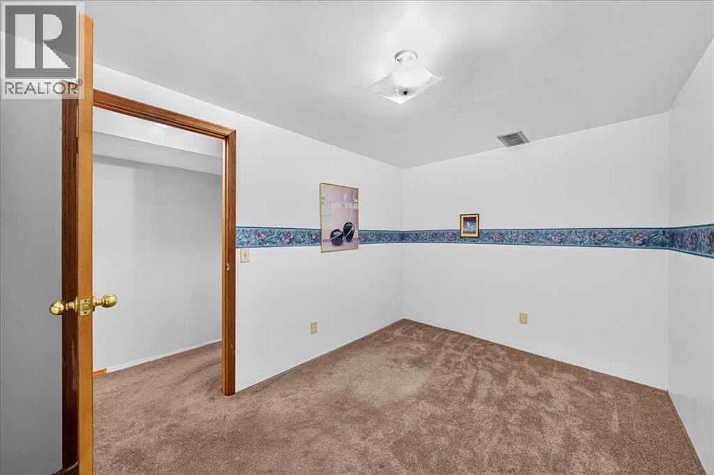 1837 Meadowbrook Drive Se, Airdrie, Alberta  T4A 1V5 - Photo 45 - A2336263