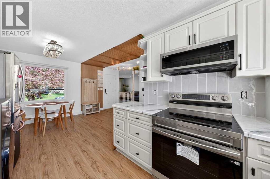 227 Martell Road NE, Calgary, Alberta  T2A 2X2 - Photo 12 - A2312097