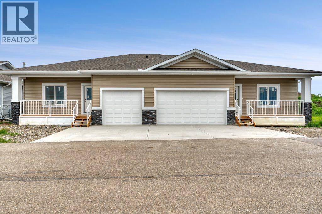 160 Ridgestone Lane, Diamond Valley, Alberta  T0L 2A0 - Photo 2 - A2325044