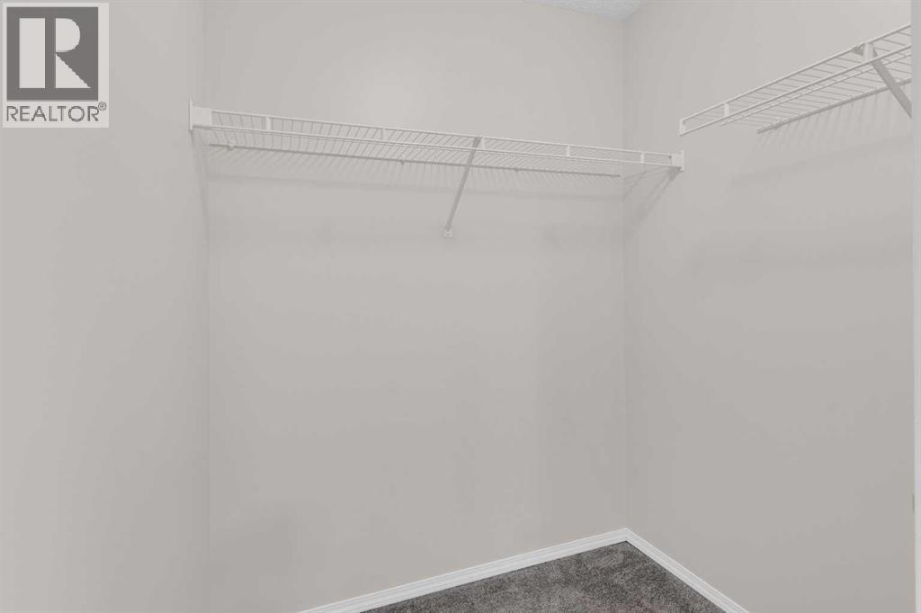 155 Tuscany Springs Gardens NW, Calgary, Alberta  T3L 2R5 - Photo 15 - A2330025