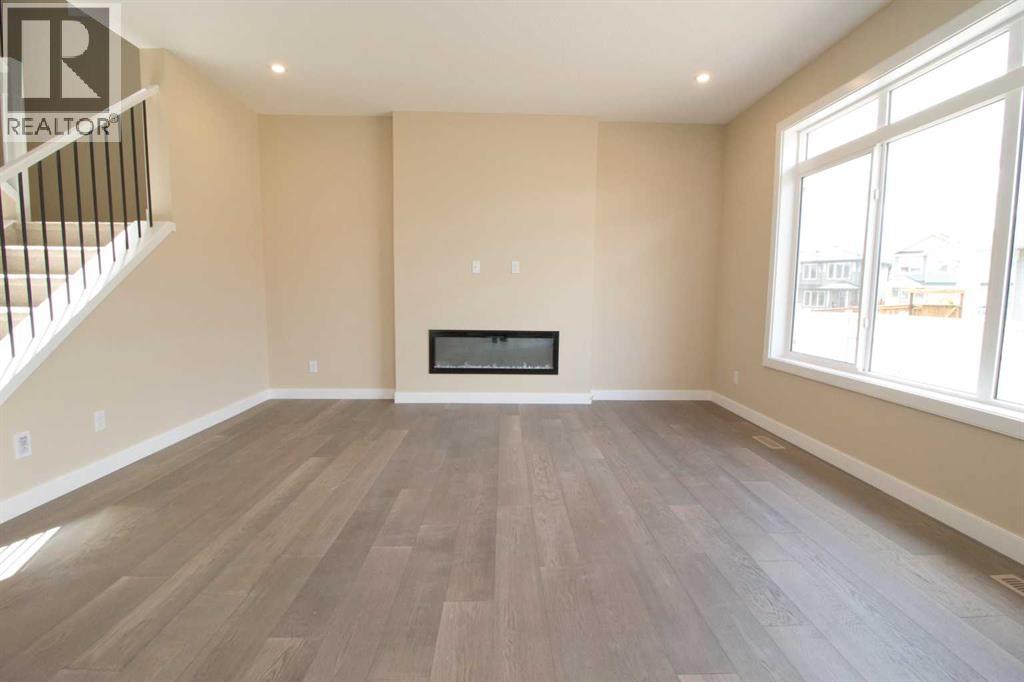 63 Sunrise Heath, Cochrane, Alberta  T4C 3C5 - Photo 4 - A2269947