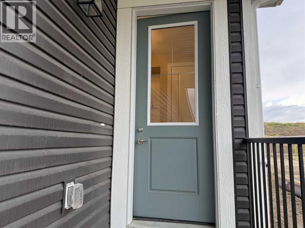 147 Sundown Crescent, Cochrane, Alberta  T4C 1Y3 - Photo 3 - A2312374