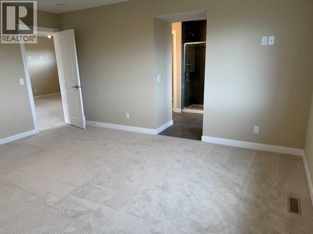 147 Sundown Crescent, Cochrane, Alberta  T4C 1Y3 - Photo 30 - A2312374