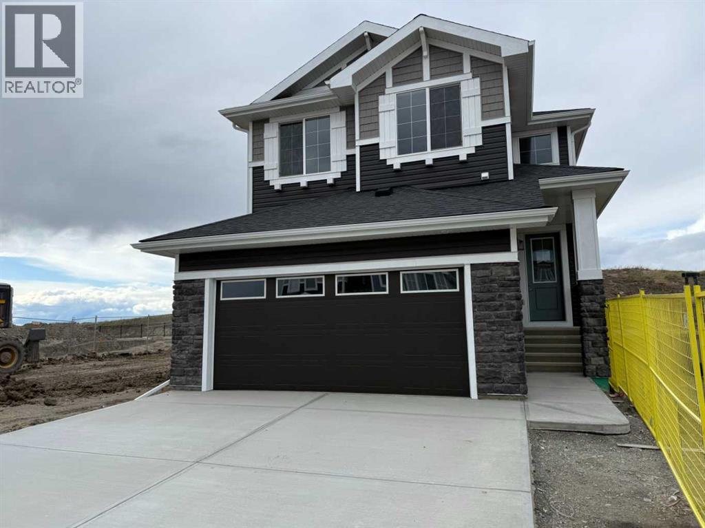 147 Sundown Crescent, Cochrane, Alberta  T4C 1Y3 - Photo 1 - A2312374