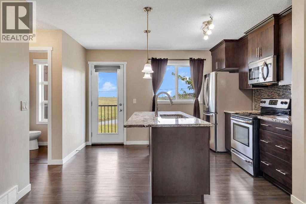 401 Copperpond Landing Se, Calgary, Alberta T2G 1Z6 - Photo 8 - A2318569