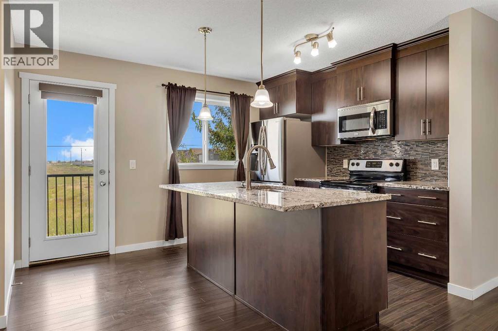 401 Copperpond Landing Se, Calgary, Alberta T2G 1Z6 - Photo 7 - A2318569