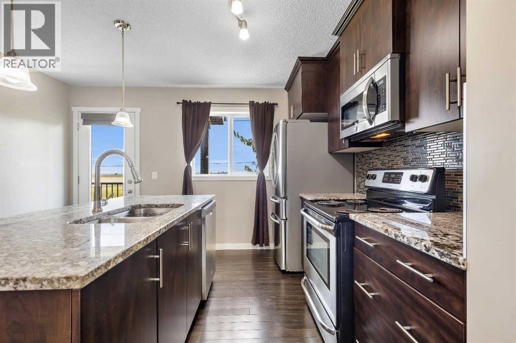 401 Copperpond Landing Se, Calgary, Alberta T2G 1Z6 - Photo 10 - A2318569
