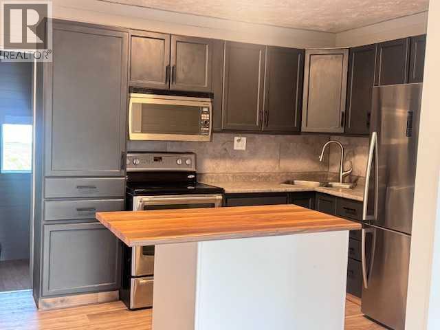 208 1 Street W, Lashburn, Saskatchewan  S0M 1M0 - Photo 3 - A2328406